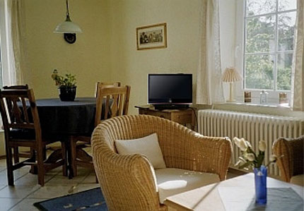 Wohnzimmer mit K&uuml;chen- und Essecke